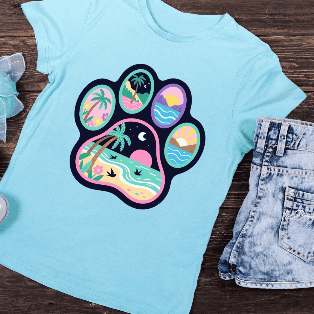 Tropical Beach Scenes in Paw Print T-Shirt Design preview image.