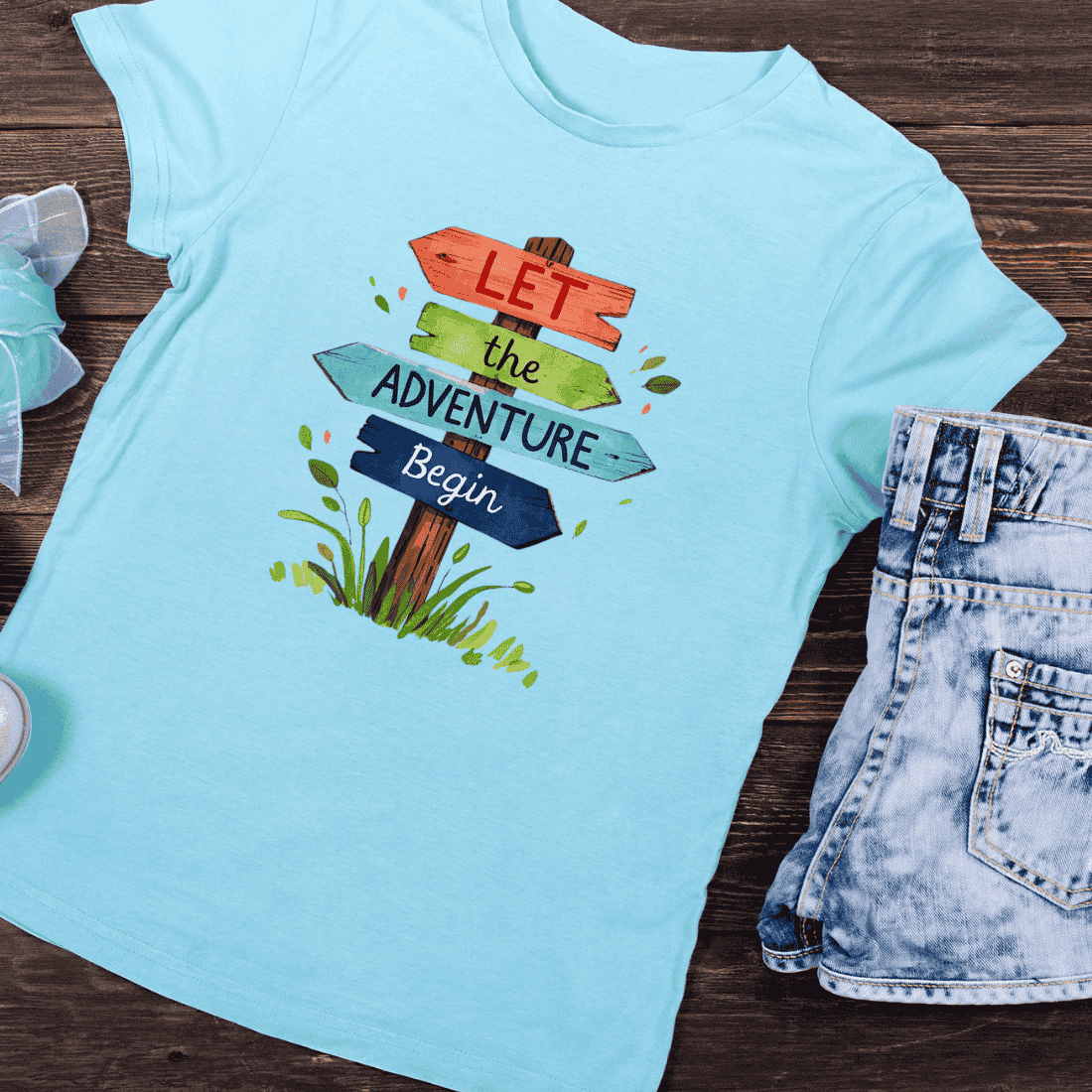 Let the Adventure Begin Signpost T-Shirt Design preview image.
