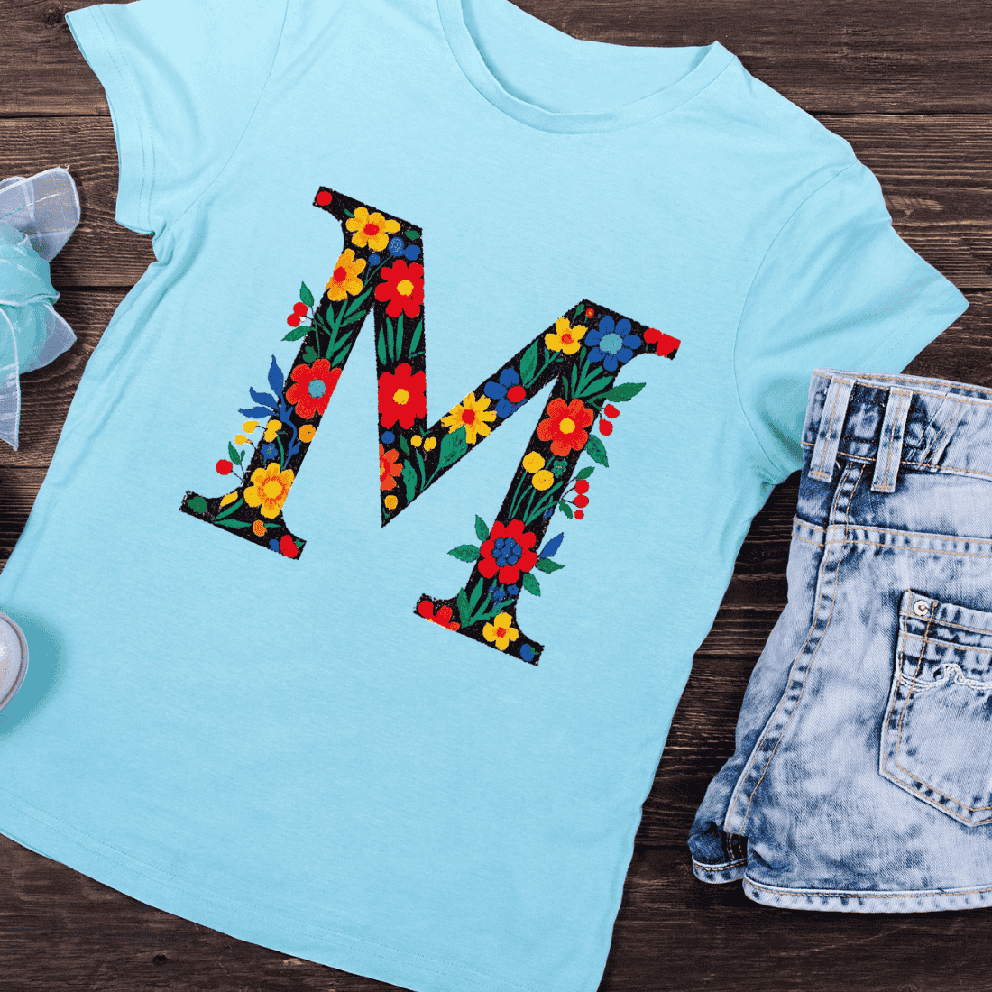 Vibrant Flower Filled Letter M T-Shirt Design preview image.