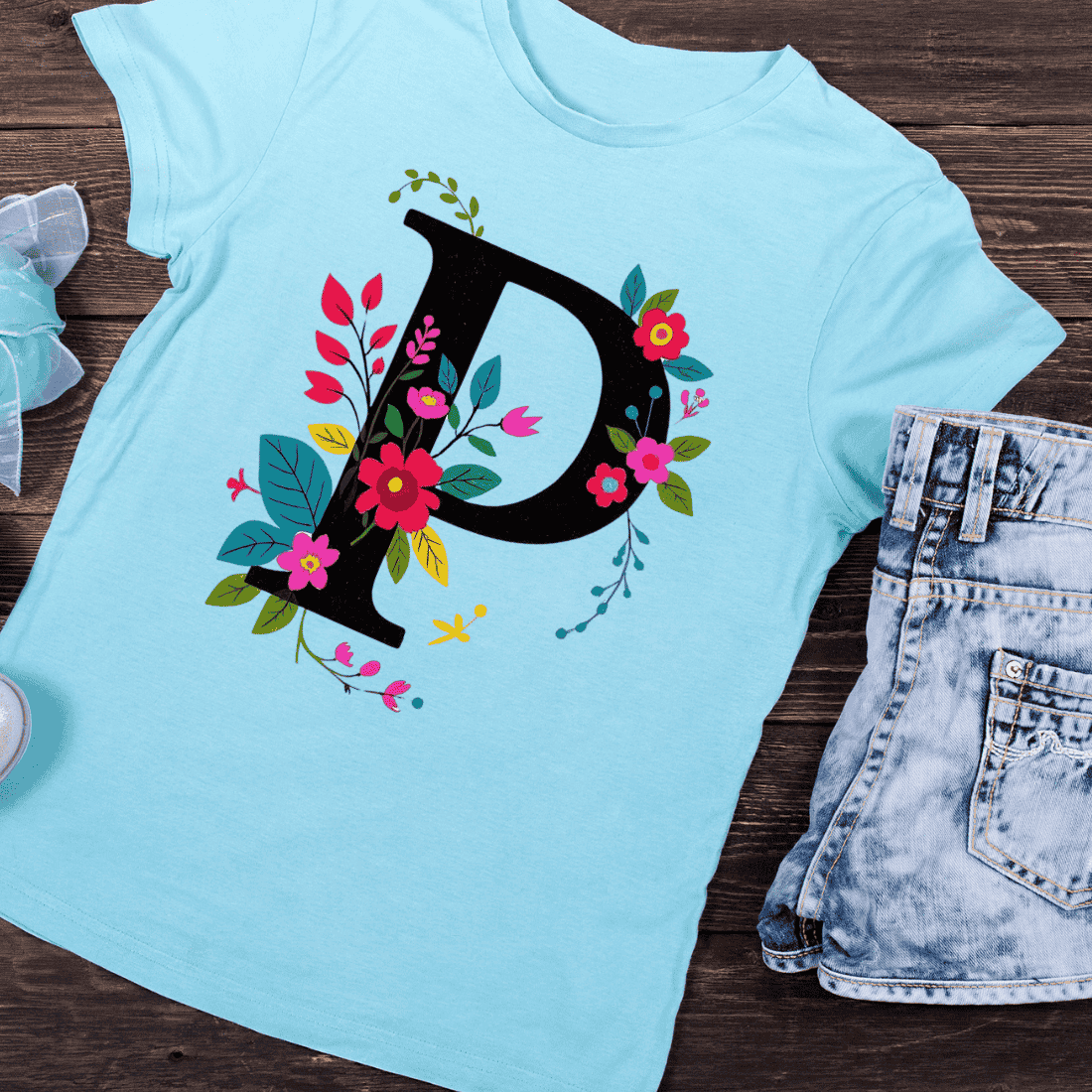 Black Letter P with Colorful Floral Decoration T-Shirt Design preview image.