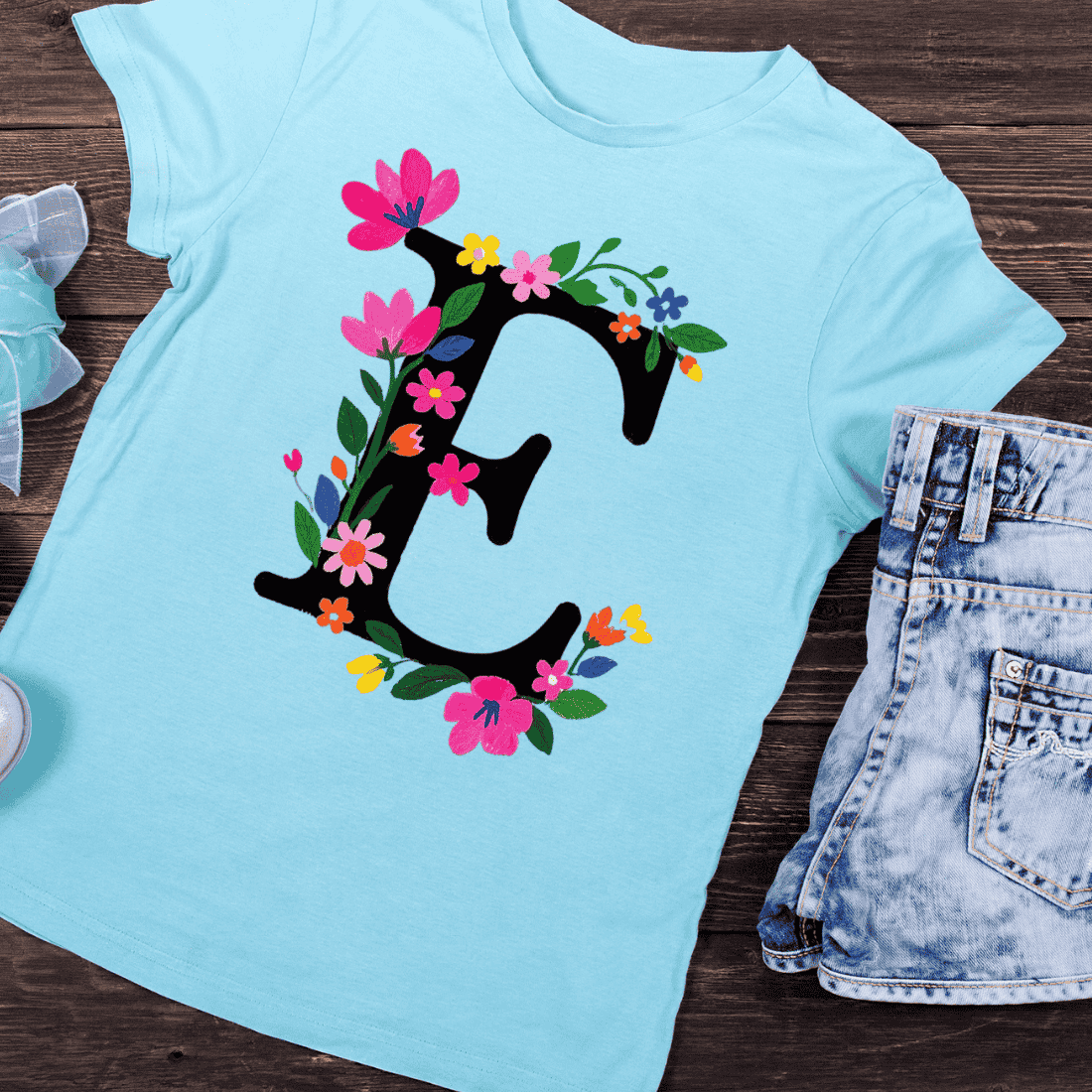 Elegant Floral Letter E Dark Botanical Monogram T-Shirt Design preview image.