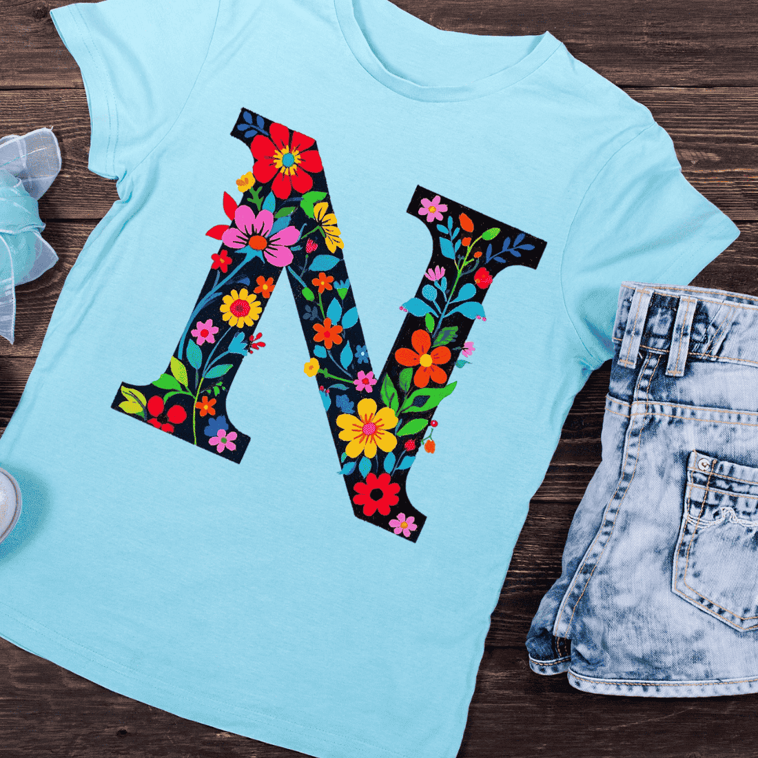 Decorative Letter N with Bright Blooms T-Shirt Design preview image.