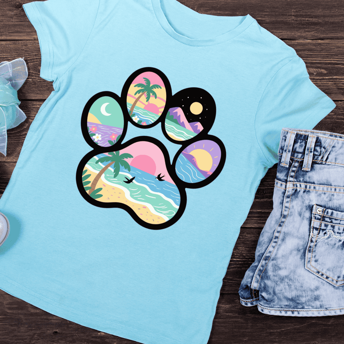 Beach Paradise in a Paw Print T-Shirt Design preview image.