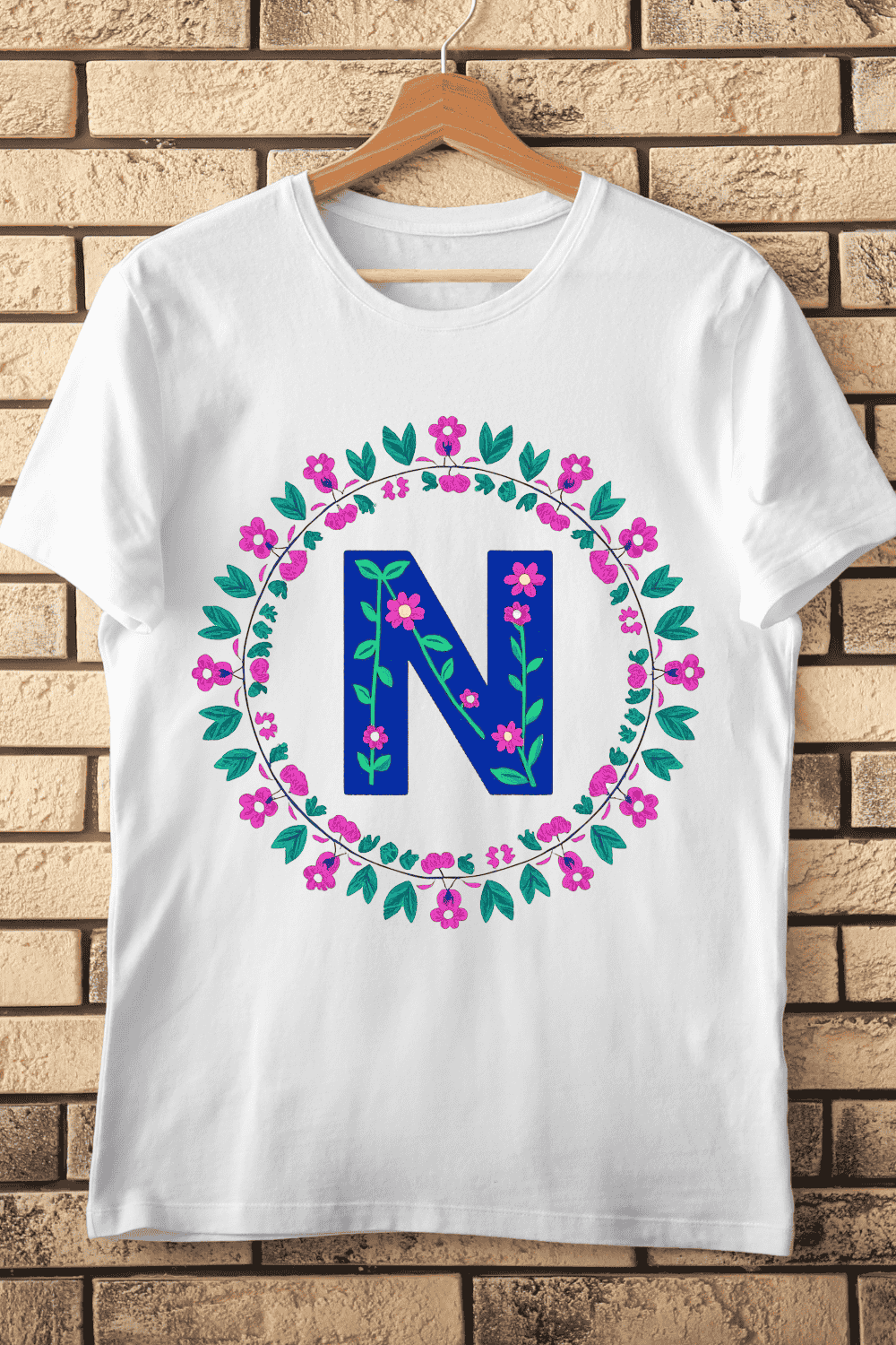 Hand-Drawn Style N in Floral Round Frame T-Shirt Design pinterest preview image.