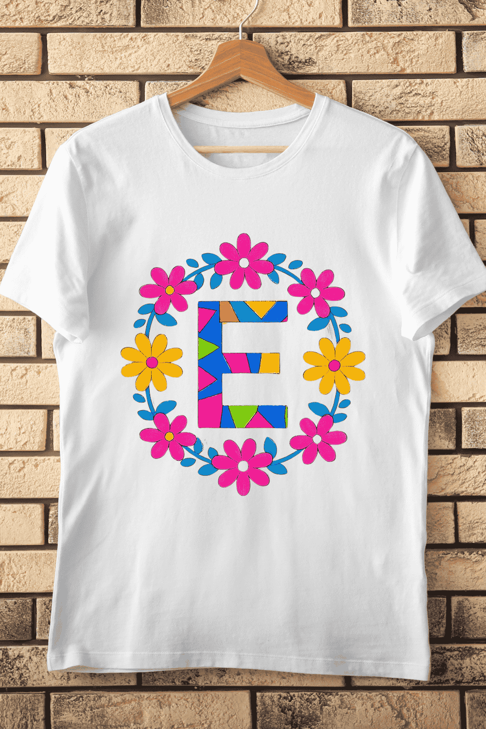 Colorful Letter E with Bright Flower Wreath T-Shirt Design pinterest preview image.