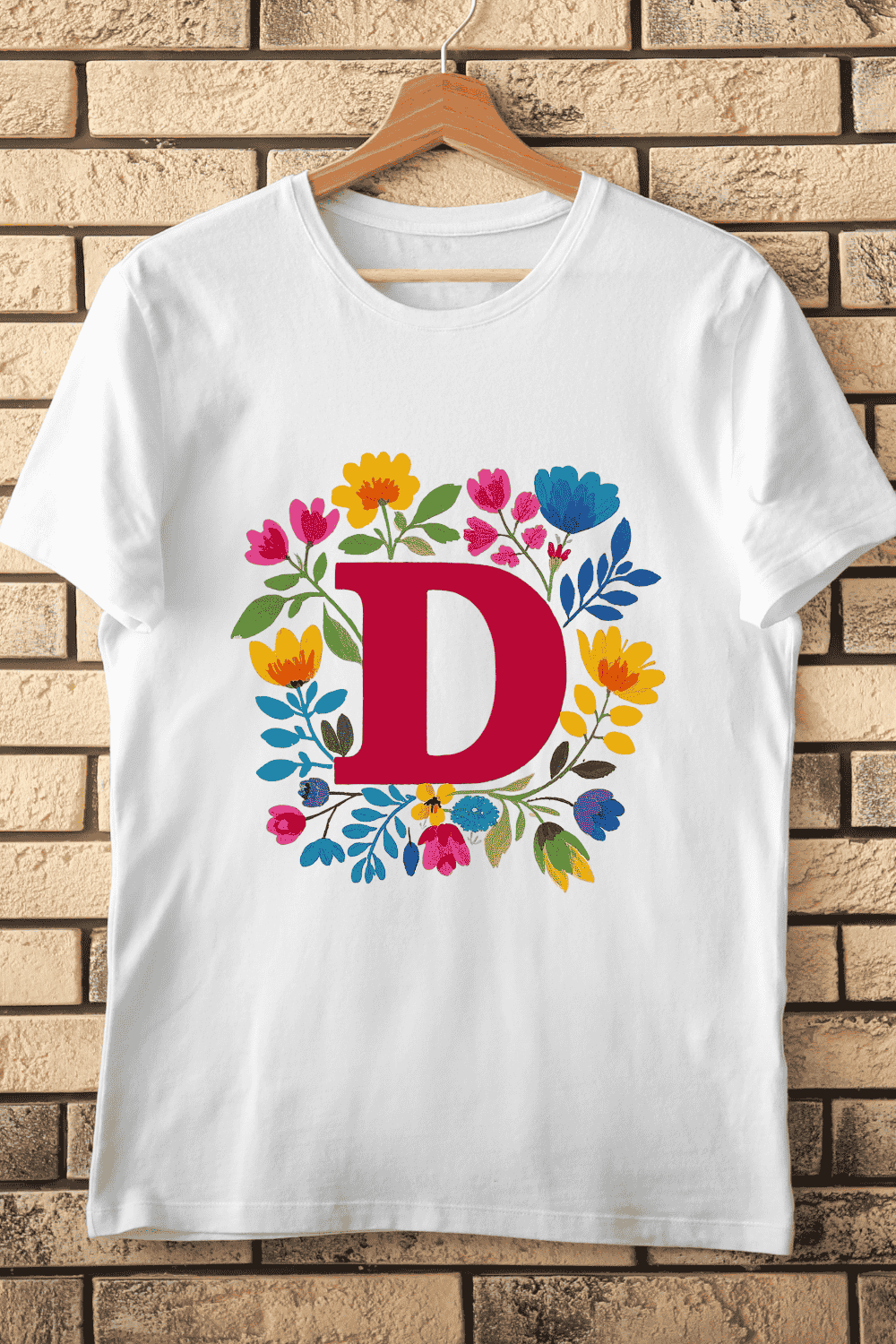 Colorful Letter D with Bright Flower Wreath T-Shirt Design pinterest preview image.