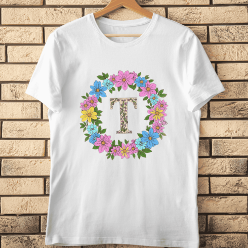 Bold Black T with Colorful Flower Frame T-Shirt Design cover image.