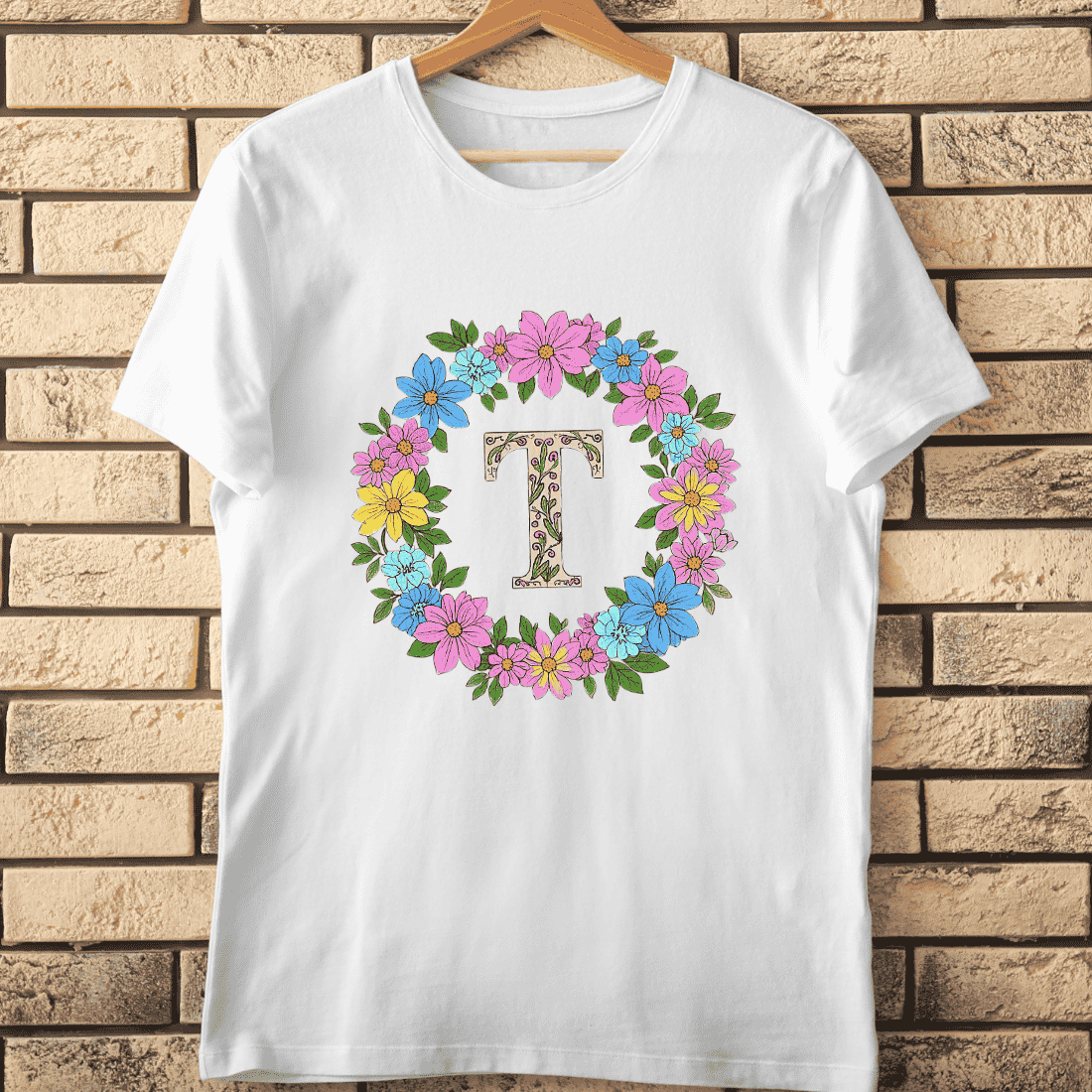Bold Black T with Colorful Flower Frame T-Shirt Design cover image.