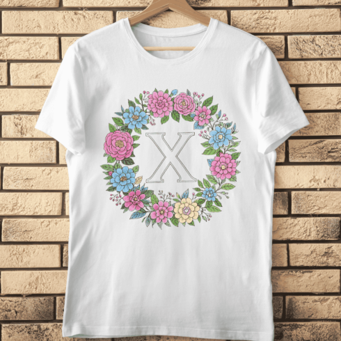 Colorful Letter X in Decorative Floral Circle T-Shirt Design cover image.