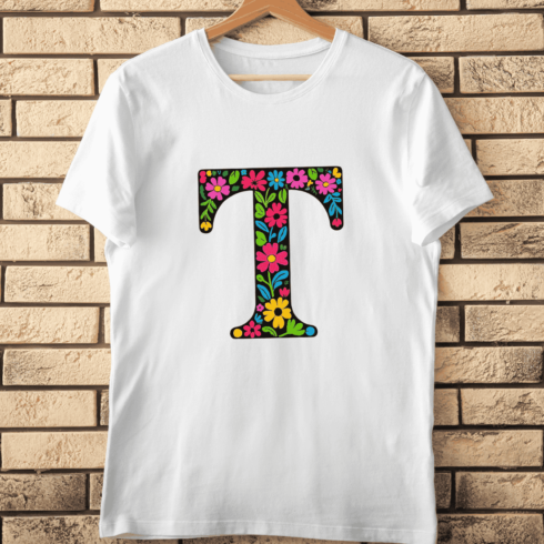 Bold Black T with Vibrant Botanical Accents T-Shirt Design cover image.