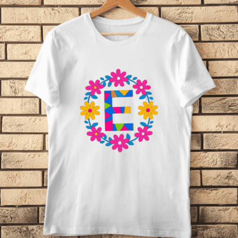 Colorful Letter E with Bright Flower Wreath T-Shirt Design cover image.