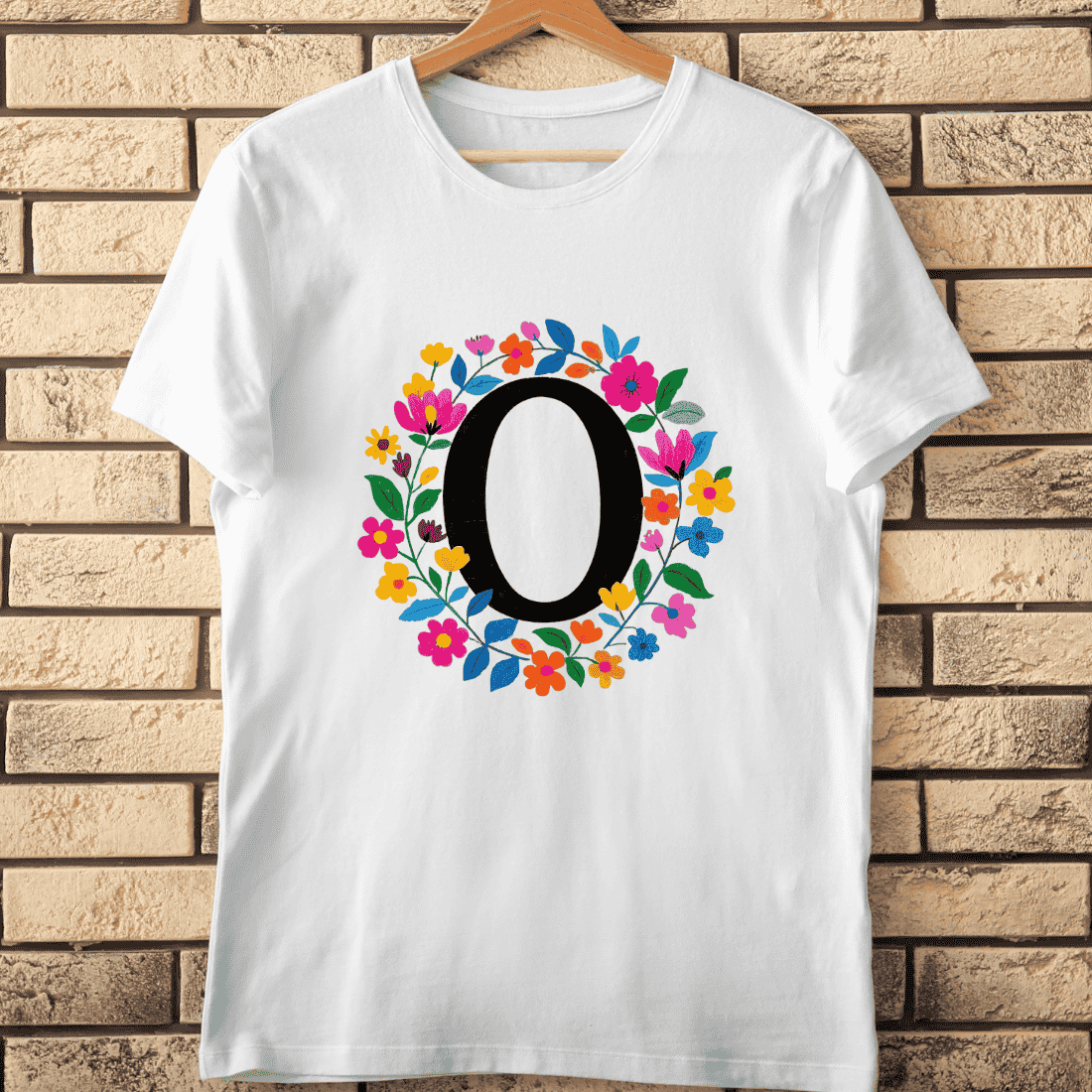 Black Letter O with Colorful Floral Wreath T-Shirt Design cover image.