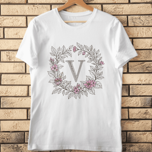Ornate V Initial in Botanical Frame T-Shirt Design cover image.