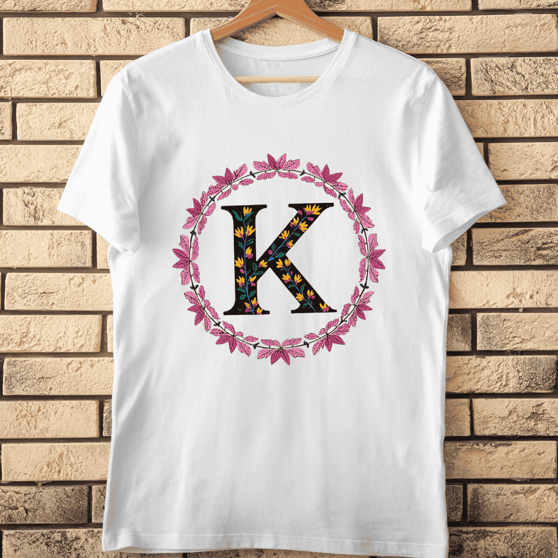 Colorful Floral K in Wreath T-Shirt Design cover image.