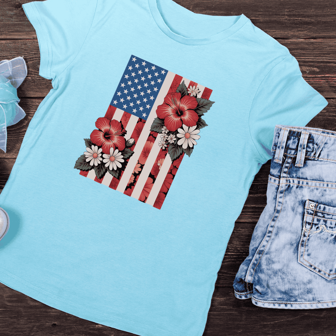 American Flag with Red Hibiscus and Daisies T-Shirt Design preview image.
