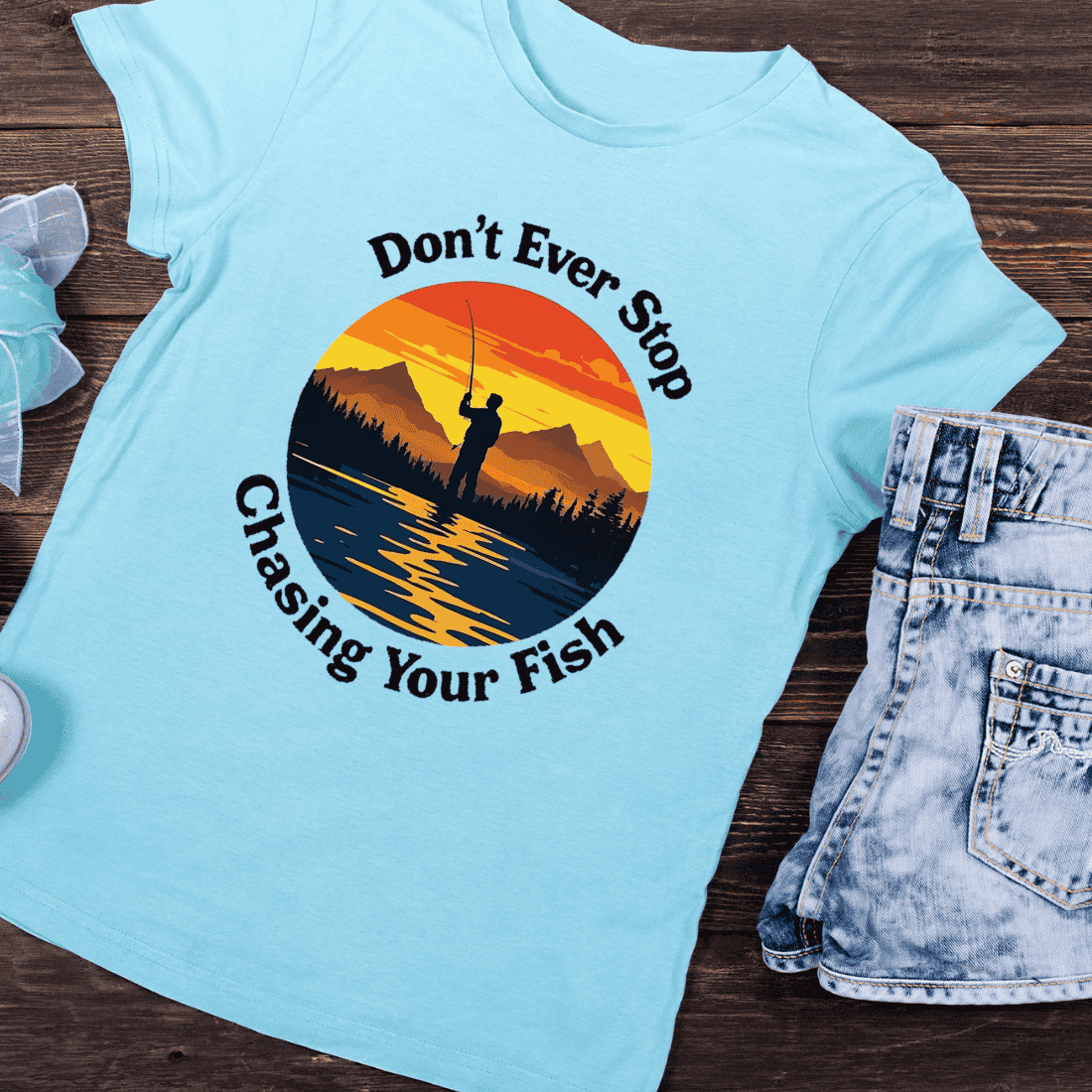 Fisherman Silhouette at Sunset T-Shirt Design preview image.