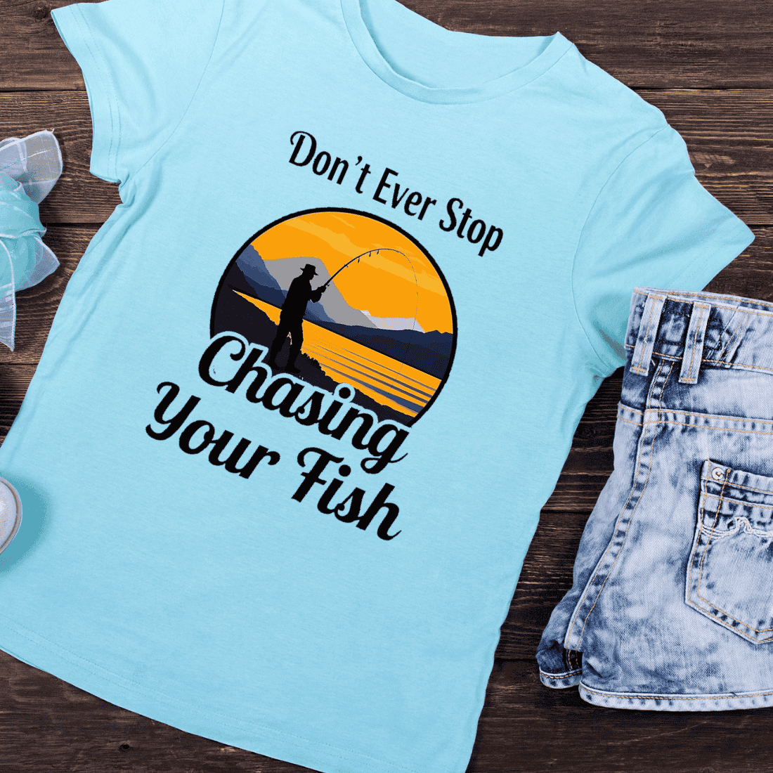 Don't Ever Stop Chasing Your Fish T-Shirt Design preview image.