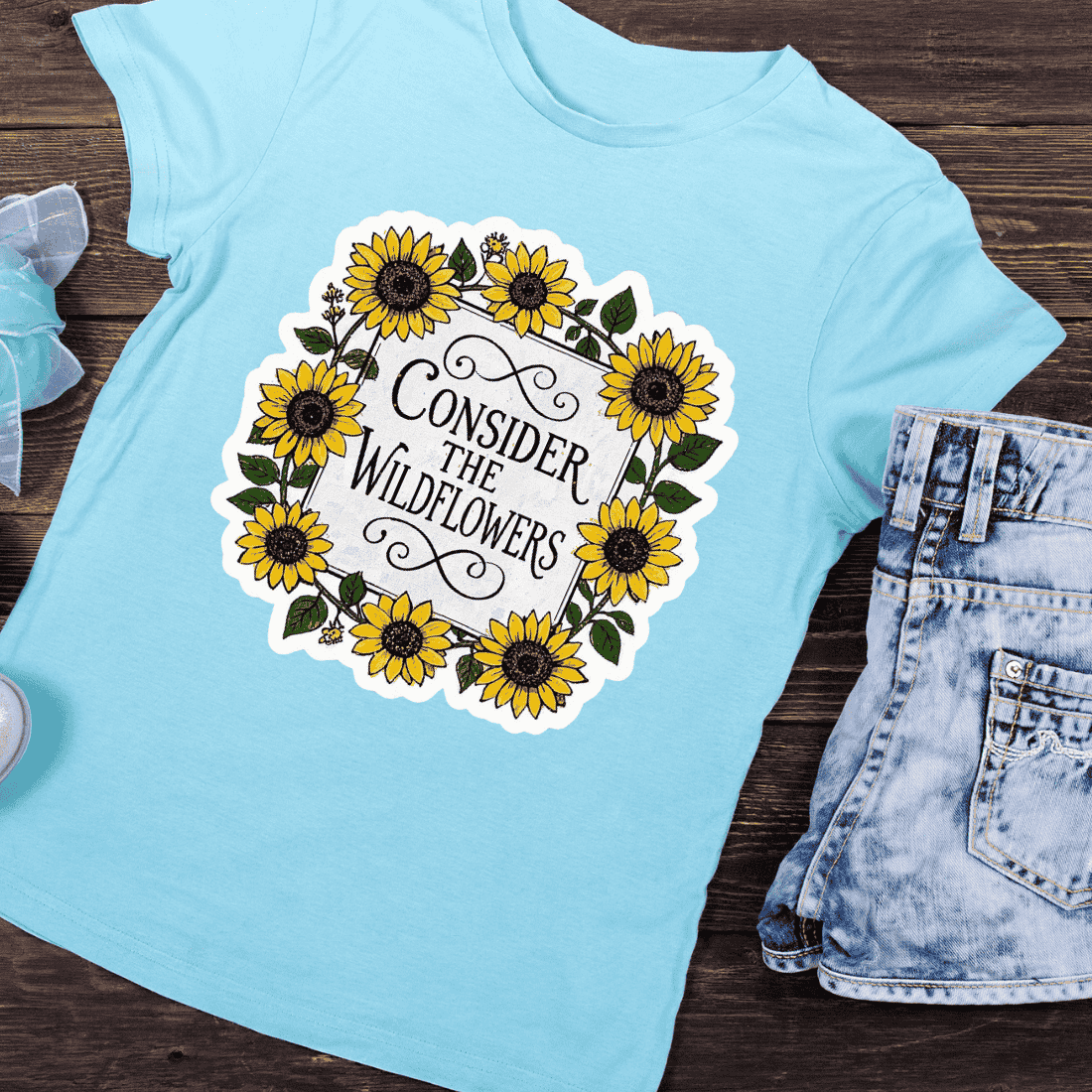 Consider the Wildflowers Sunflower Wreath T-Shirt Design preview image.