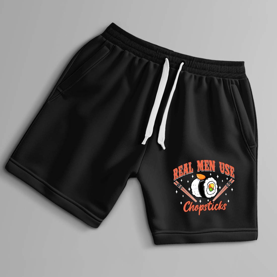 funny sushi quote graphic design – real men use chopsticks with cartoon rolls and chopsticks. graphic design. 9 black shorts up 410