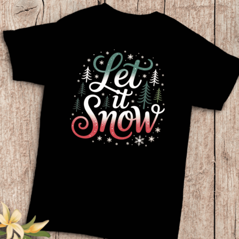 Holiday Season Let It Snow Text with Snowflakes T-Shirt Design cover image.