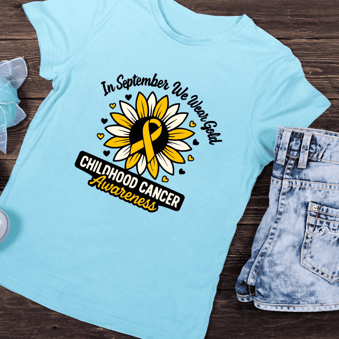 September We Wear Gold With Sunflower T-Shirt Design preview image.
