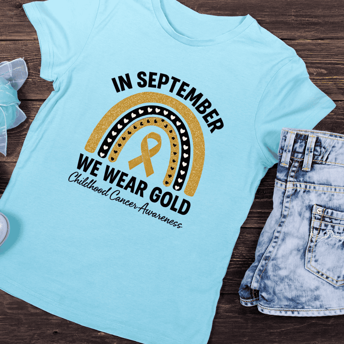 In September We Wear Gold for Childhood Cancer T-Shirt Design preview image.
