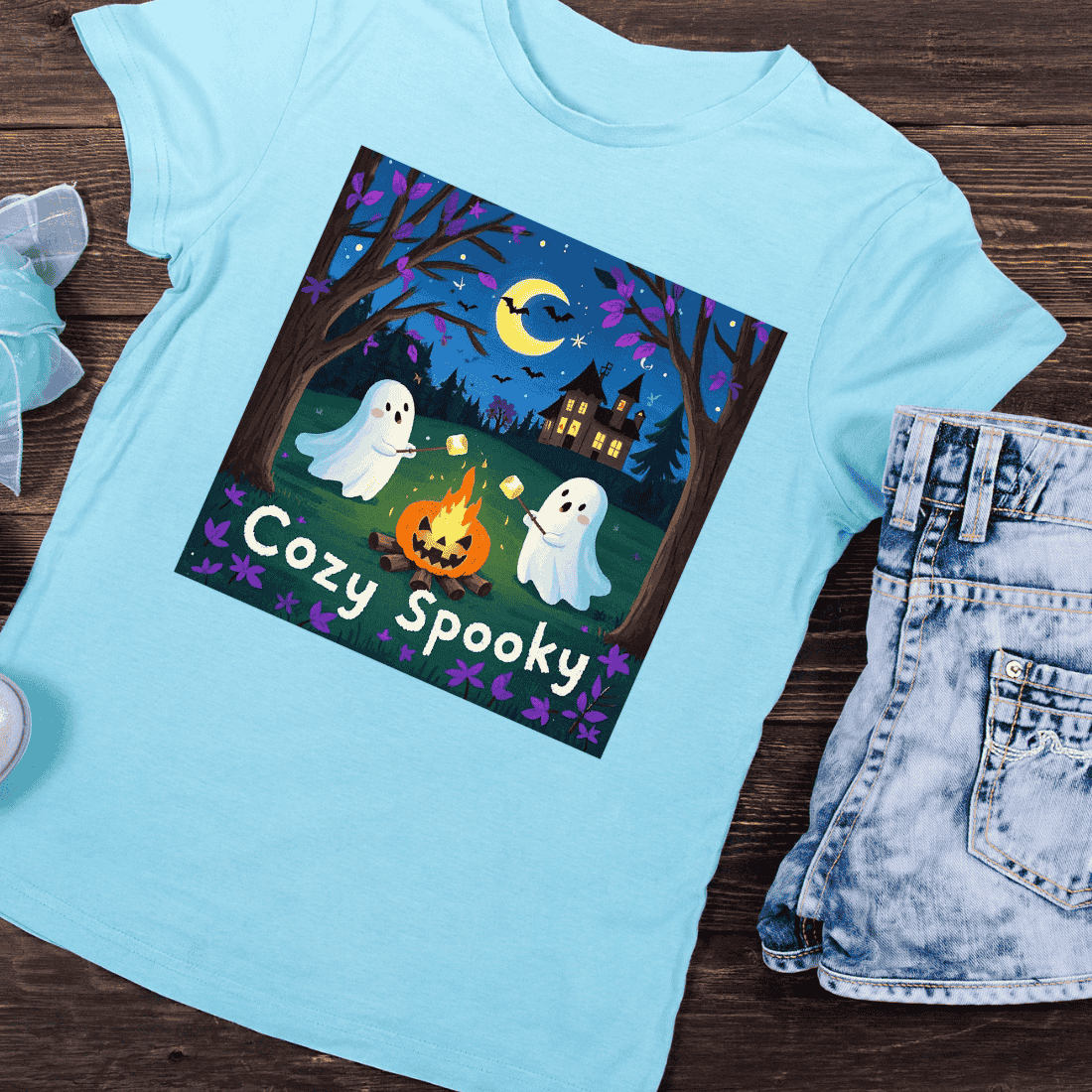 Adorable Ghost Campfire Scene T-Shirt Design preview image.