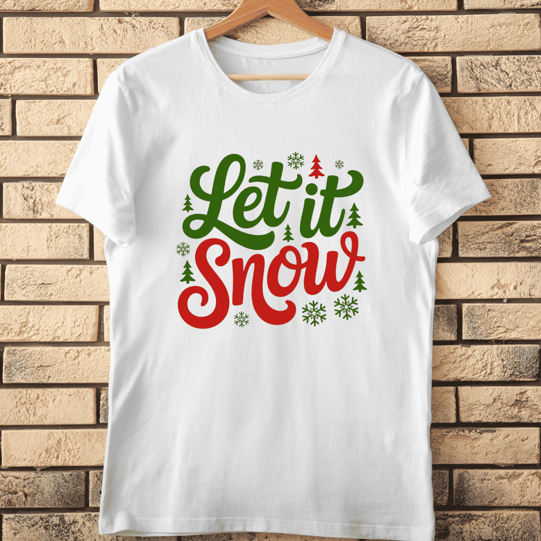 Let It Snow Lettering with Snowflakes and Trees T-Shirt Design cover image.