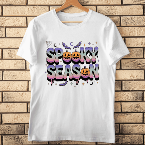 Spooky Season Lettering with Pumpkins and Bats T-shirt Design cover image.