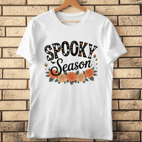 Spooky Season Quote with Flowers T-shirt Design cover image.