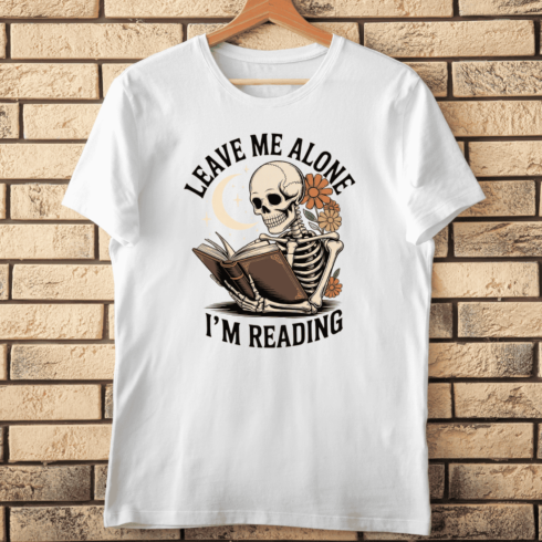 Reading Skeleton with Leave Me Alone I'm Reading T-Shirt Design cover image.