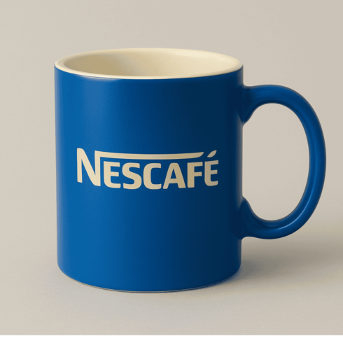 "Nescafé Coffee Mug Branding Mockup in blue & red colour" cover image.