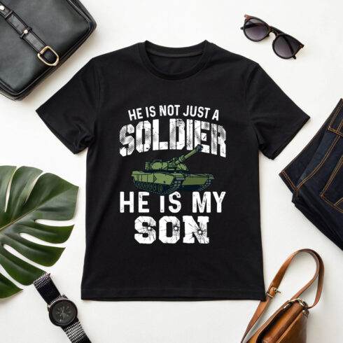 he is not just a soldier he is my son patriotic quote graphic for apparel cover image.