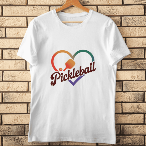 Rainbow Heart and Pickleball Typographic T-shirt Design cover image.
