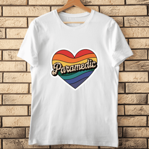 Rainbow Heart with Paramedic Text T-shirt Design cover image.