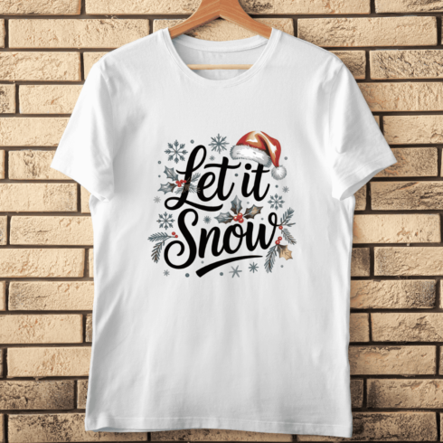 Festive Let It Snow Lettering with Santa Hat and Holly T-shirt Design cover image.