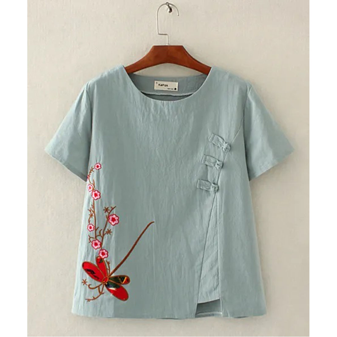 The women’s mandarin‑collar shirt with dragonfly embroidery cover image.