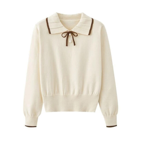 This knitted long-sleeve sweater cover image.
