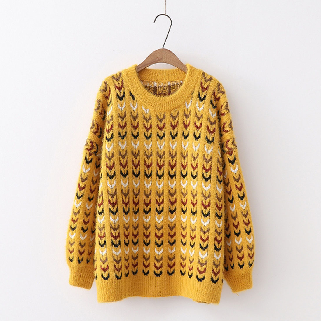 The oversized twisted‑pattern sweater cover image.