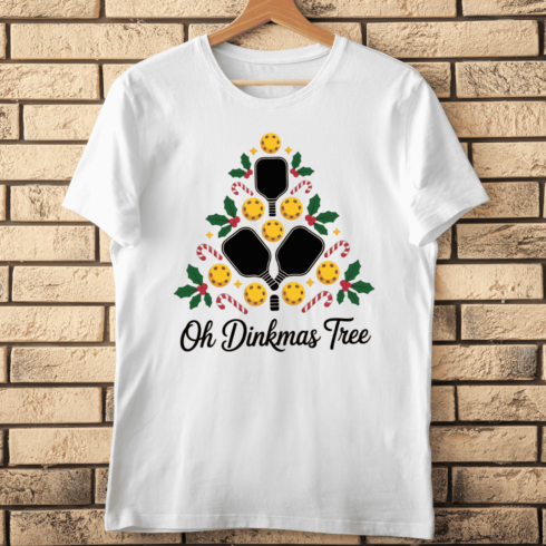 Pickleball Paddle and Ball Festive Tree T-Shirt Design cover image.