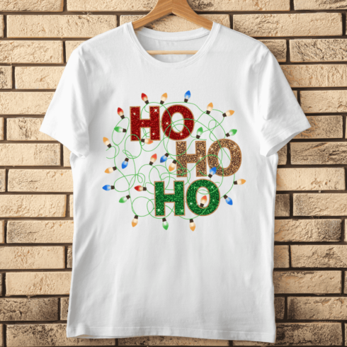HO HO HO Glitter Text with Holiday String Lights T-Shirt Design cover image.
