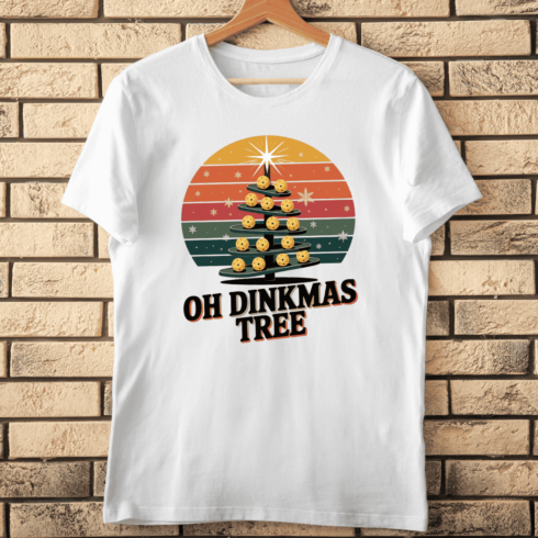 Vintage Oh Dinkmas Tree with Pickleballs T-Shirt Design cover image.