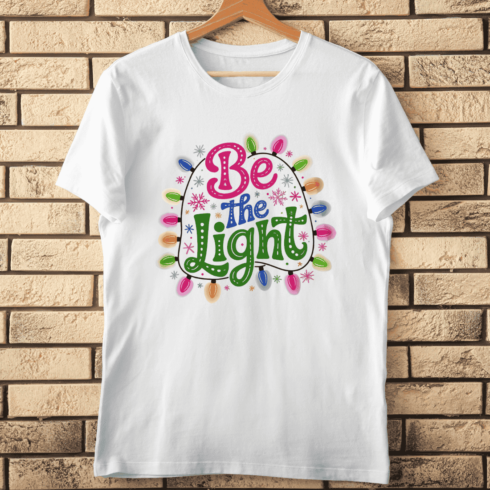 Retro Holiday String Lights and Motivational Text T-Shirt Design cover image.
