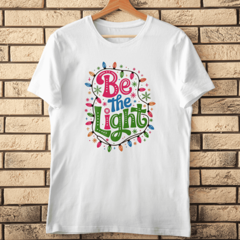 Be The Light Circle Wreath for Decoration T-Shirt Design cover image.