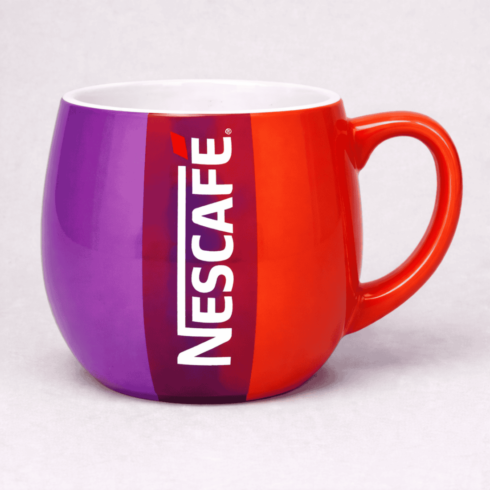 Colorful Coffee Mug Mockup Featuring Nescafé Branding cover image.