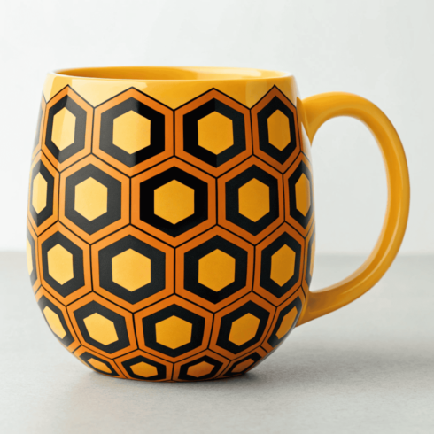 Yellow Coffee & Tea Mug Mockup with Black & Orange Hexagon Pattern cover image.