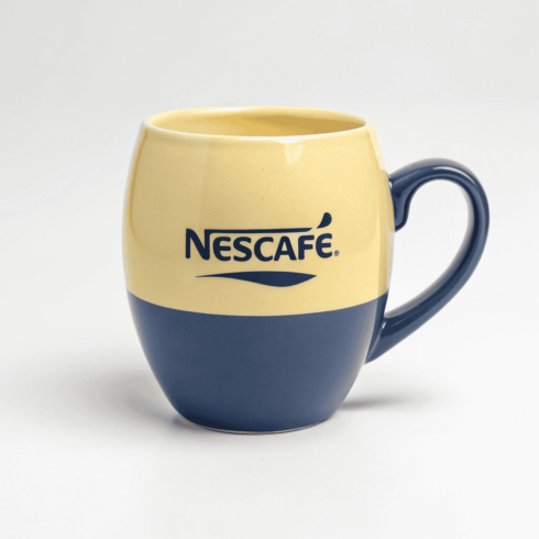 Nescafé Vanilla Yellow & Blue Mug Mockup Pair cover image.
