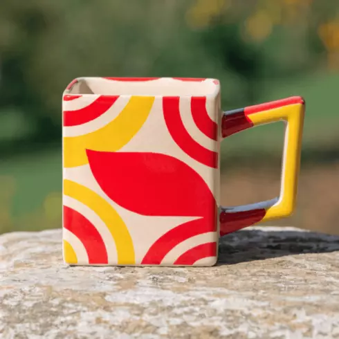 “Elegant Multicolor Square Mug Mockup Pair – Orange Red, Yellow & Cream Branding Presentation” cover image.