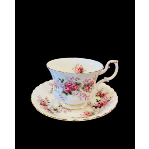 Elegant Floral Porcelain Mug with Gold Trim and Rose Design cover image.