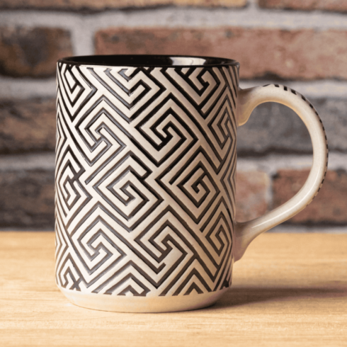 Elegant Cream Coffee & Tea Mug Mockup Pair with Black Geometric Pattern cover image.